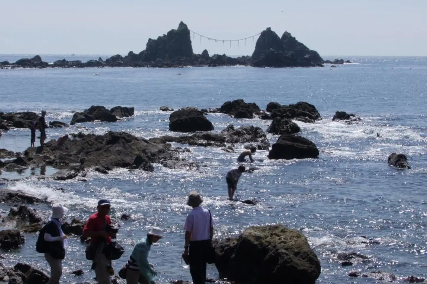 The three sacred Mitsuishi rocks rising from the sea at Cape Manazuru on Sagami Bay