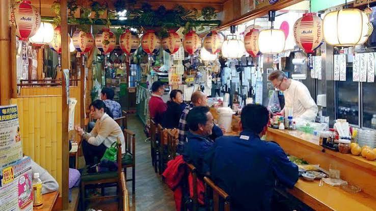 Cozy traditional Japanese izakaya pub with seasonal dishes