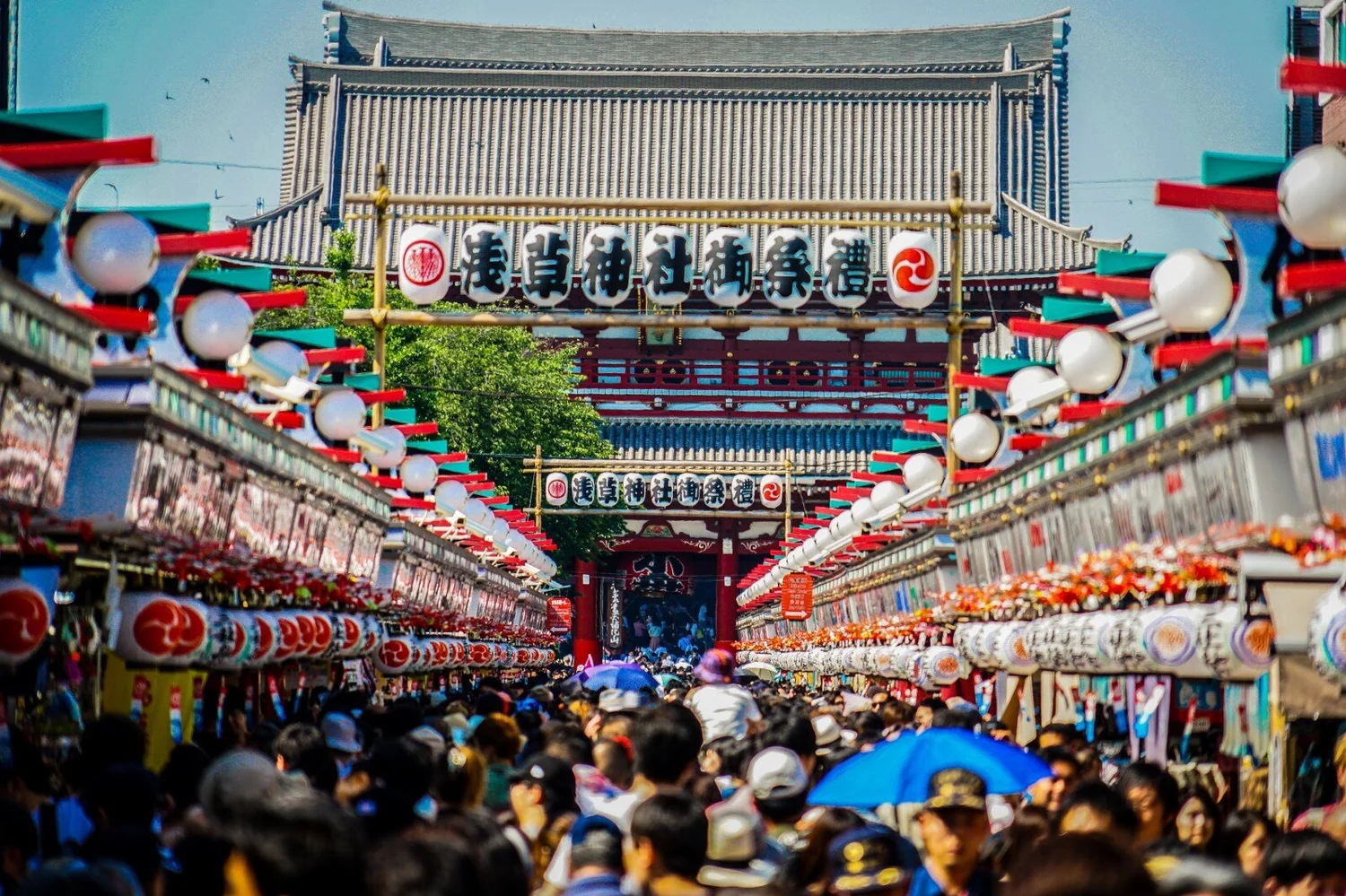 Senso-ji Temple main hall and Nakamise shopping street during a private tour in Asakusa Tokyo.