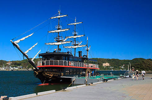 A Black Ship replica cruise boat docked in Shimoda Port