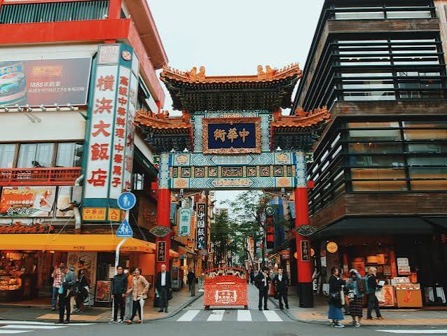 Vibrant entrance gate to Yokohama Chinatown along the waterfront city promenade